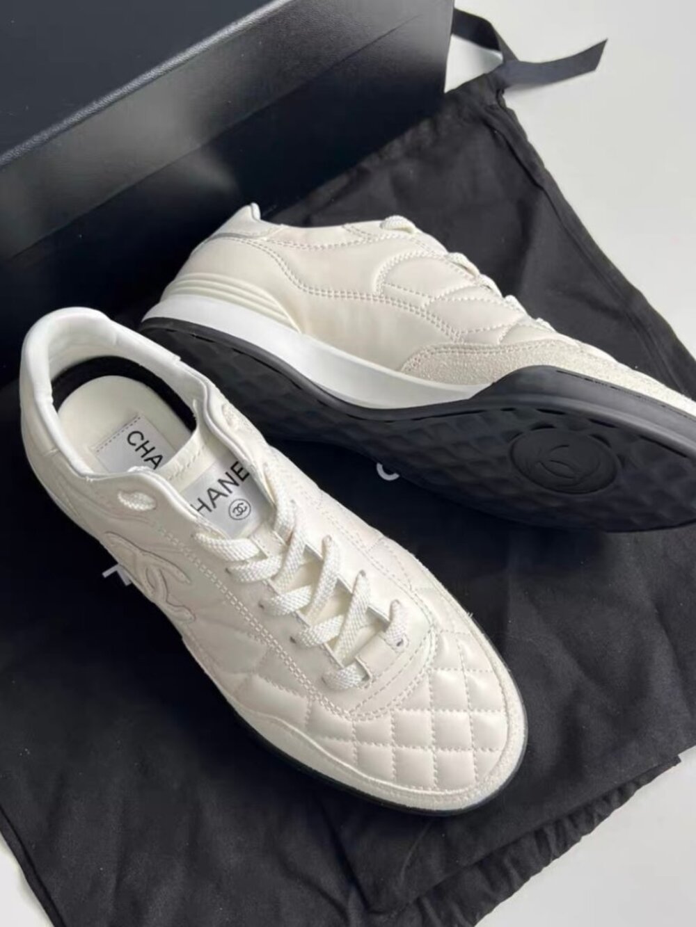 Chanel White Quilted Leather CC Logo Low Top Sneakers